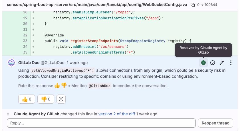 A GitLab merge request diff with an inline comment from the GitLab Duo bot warning that setAllowedOriginPatterns('*') allows connections from any origin and could be a security risk, with a tooltip showing the thread was resolved by Claude Agent by GitLab