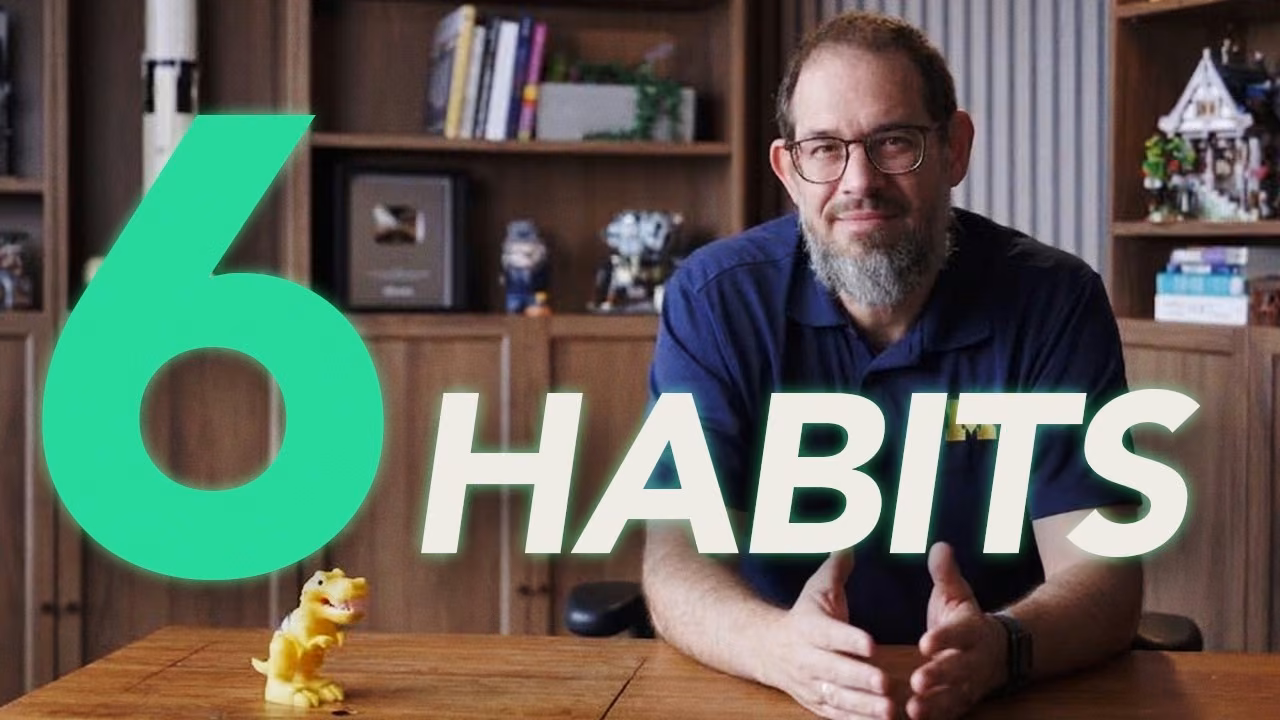 Nate B Jones seated at a desk in front of bookshelves, with large '6 HABITS' text overlaid on the video thumbnail