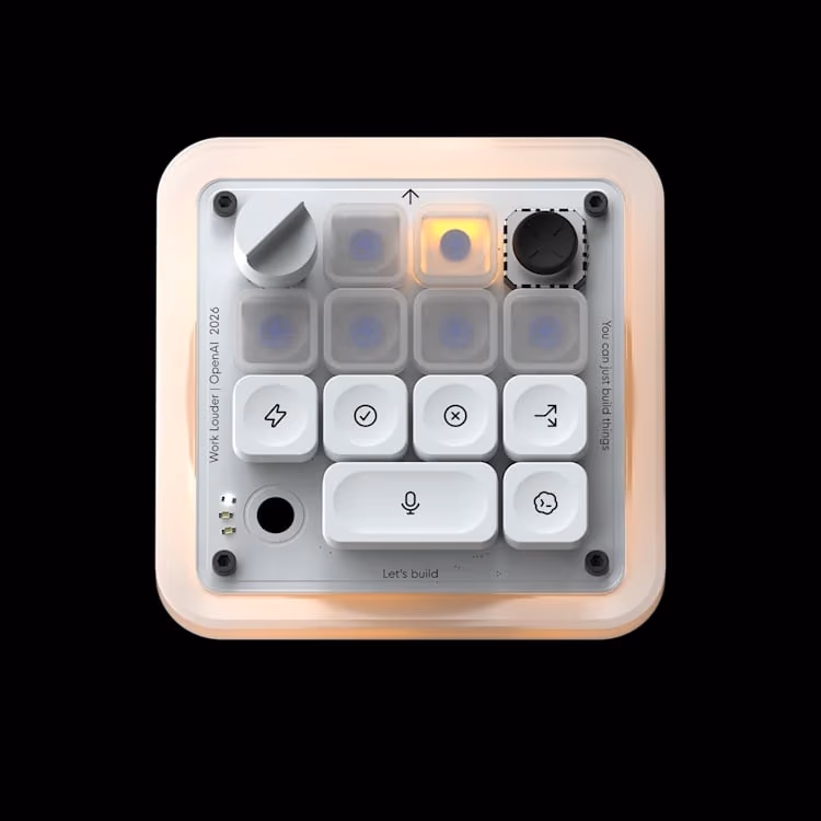 Codex Micro macro pad viewed from directly above, showing its illuminated amber Agent Keys, rotary dial, joystick and Command Keys row